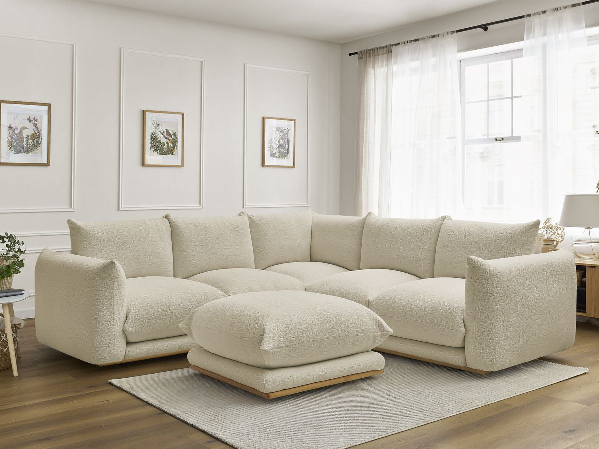 Hjørnesofa ERNEST i bouclé-stoff med puff