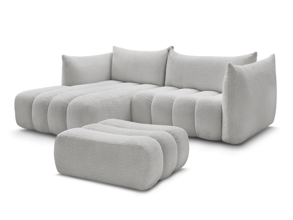 Hjørnesofa AZRA i bouclé-stoff med puff