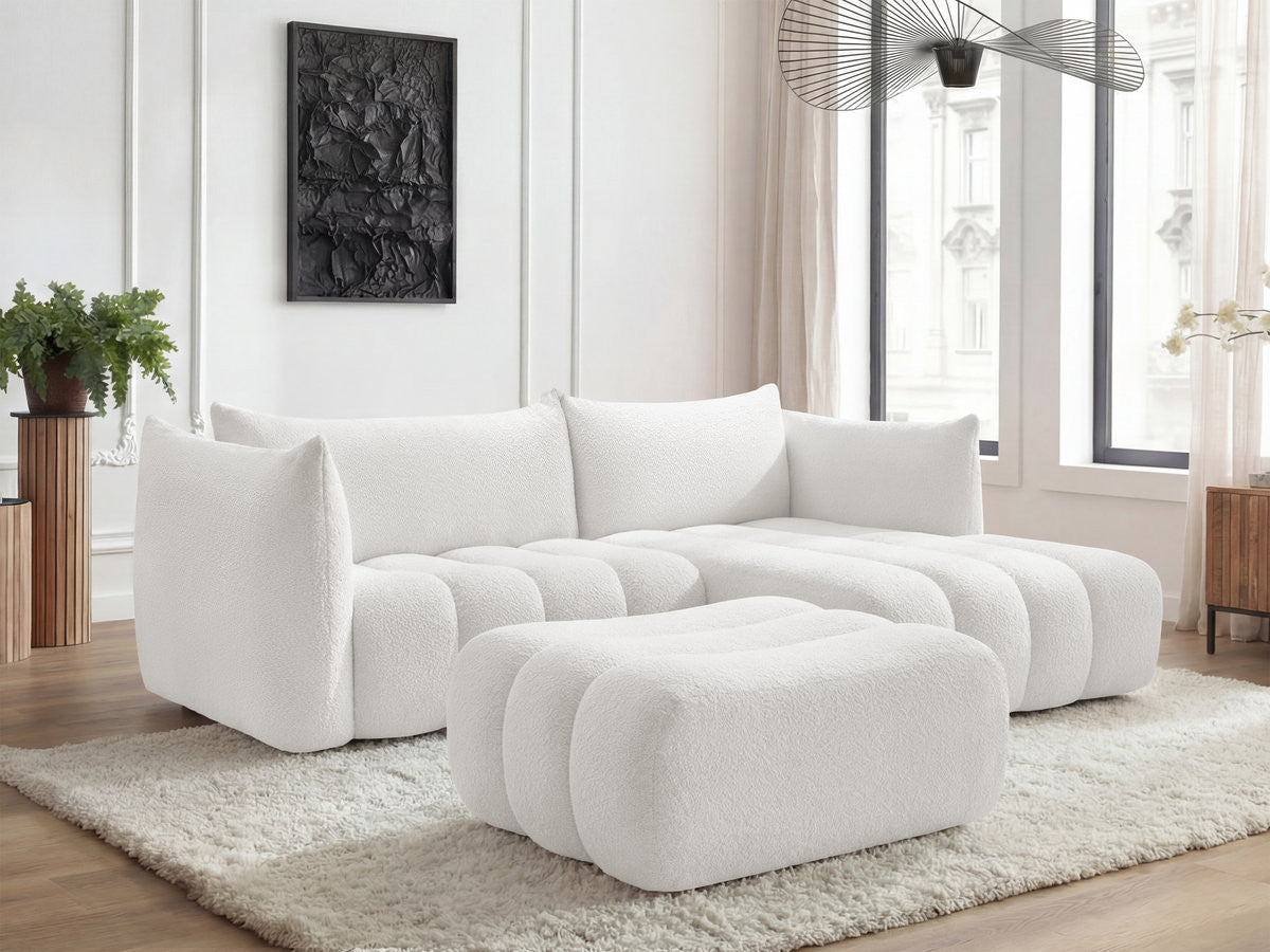 Hjørnesofa AZRA i bouclé-stoff med puff