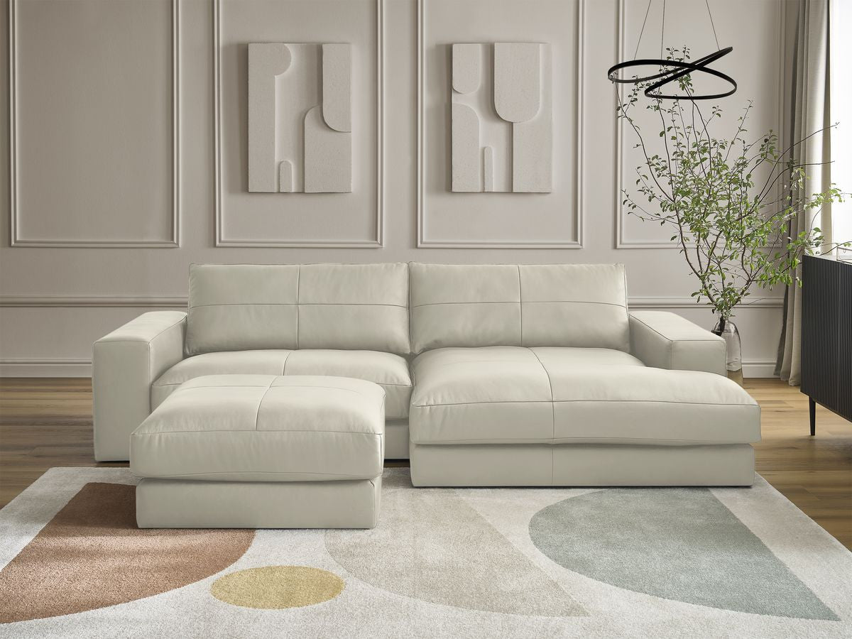 Hjørnesofa LEONARD skinn med puff
