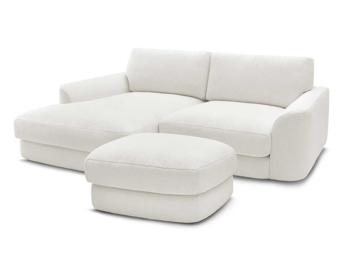 Hjørnesofa LEONORE i bouclé-stoff med puff
