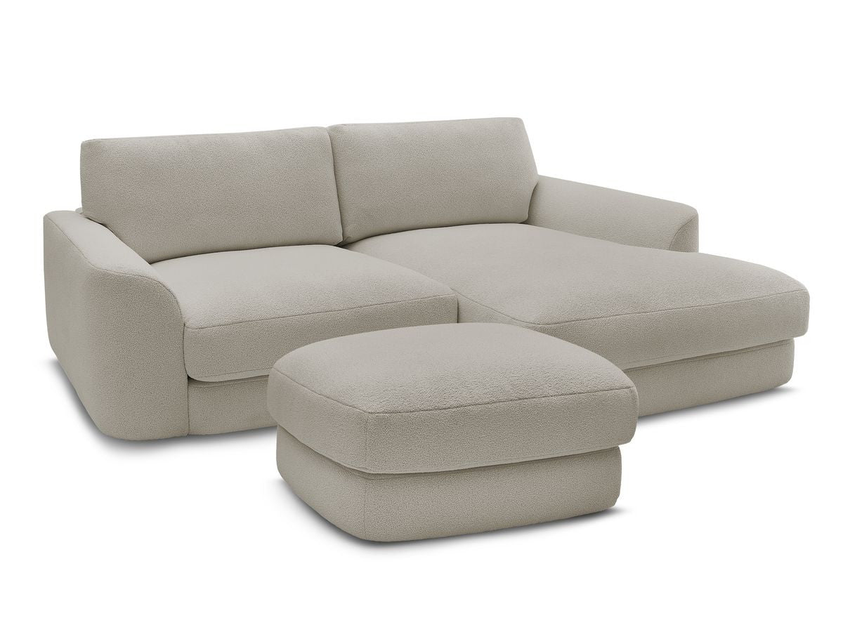 Hjørnesofa LEONORE i bouclé-stoff med puff