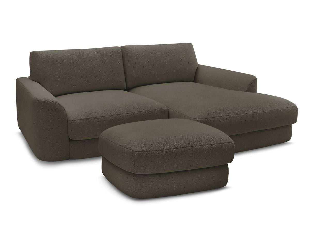 Hjørnesofa LEONORE i bouclé-stoff med puff