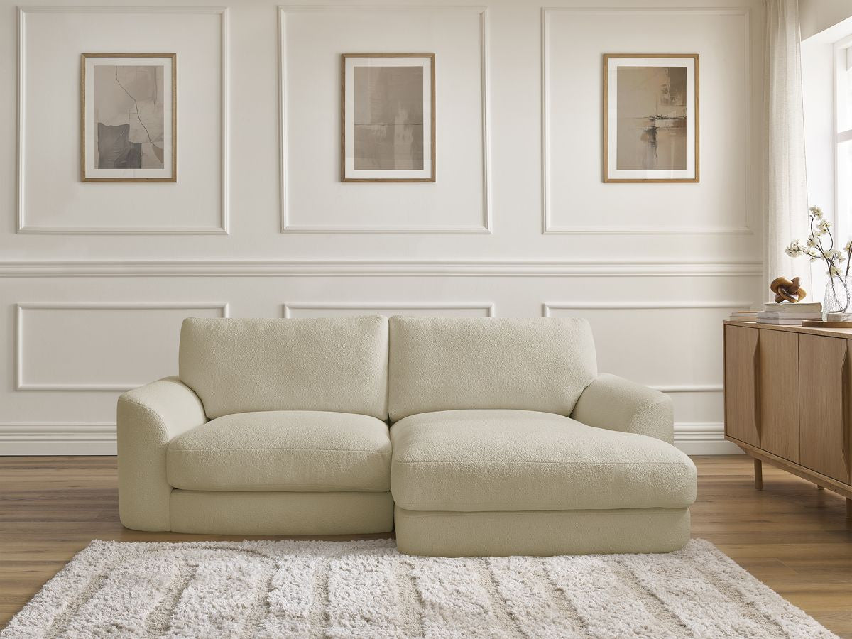 Hjørnesofa LEONORE i bouclé-stoff