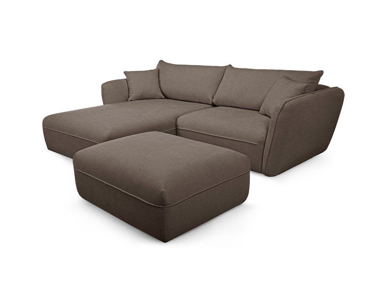 Hjørnesofa LUIGI i glatt stoff med puff
